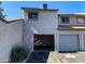 View of home's exterior showcasing its two-story design and attached garage at 244 E Ponderosa Ln, Phoenix, AZ 85022