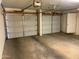 Spacious two car garage with two doors, ready to protect your vehicles from the elements at 244 E Ponderosa Ln, Phoenix, AZ 85022