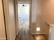Hallway with new flooring leading into bedroom at 244 E Ponderosa Ln, Phoenix, AZ 85022