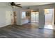 Open living room with wood-look floors and backyard access at 244 E Ponderosa Ln, Phoenix, AZ 85022