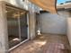 Brick patio with shade sail and sliding glass door at 244 E Ponderosa Ln, Phoenix, AZ 85022