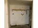 Utility room with a shelf and water heater, ready for appliances and storage at 244 E Ponderosa Ln, Phoenix, AZ 85022