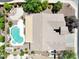 An eye-catching aerial view of a house with a great backyard pool and patio at 2472 E Prescott Pl, Chandler, AZ 85249
