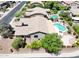 Real estate showcasing a house, pool with spa, patio, and lush landscaping at 2472 E Prescott Pl, Chandler, AZ 85249