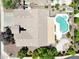 Birds eye view of a house highlighting the pool with lounge chairs and fire pit at 2472 E Prescott Pl, Chandler, AZ 85249