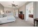 Spacious main bedroom with neutral walls leading into the main bathroom at 2472 E Prescott Pl, Chandler, AZ 85249