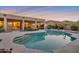 Backyard pool with steps and desert landscaping providing a relaxing outdoor oasis at 2472 E Prescott Pl, Chandler, AZ 85249