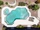 Aerial view of the pool featuring a spa and deck chairs at 2472 E Prescott Pl, Chandler, AZ 85249