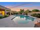Backyard pool featuring a built-in spa and desert landscaping perfect for outdoor relaxation at 2472 E Prescott Pl, Chandler, AZ 85249