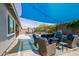Backyard area with pool, lounge furniture, and shade structure provides plenty of space for entertaining at 2513 E Pleasant Ln, Phoenix, AZ 85042