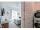 Cozy bedroom featuring a soft bed, calming decor, and ample natural light for relaxation at 2513 E Pleasant Ln, Phoenix, AZ 85042