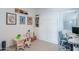 Versatile room featuring a murphy bed, play area, and built-in desk for flexible living at 2513 E Pleasant Ln, Phoenix, AZ 85042