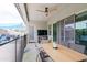 This covered patio includes an outdoor ceiling fan and plenty of room for entertaining guests at 2513 E Pleasant Ln, Phoenix, AZ 85042
