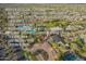 Mountain Vista Club with outdoor event lawn, four lighted tennis courts, movement studio, teen game room, and catering kitchen at 29491 N 122Nd Gln, Peoria, AZ 85383