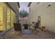 Cozy backyard with comfortable seating and a fire pit, ideal for relaxing evenings at 29491 N 122Nd Gln, Peoria, AZ 85383