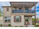 Charming two-story home showcasing a cozy front porch and well-maintained landscaping at 29491 N 122Nd Gln, Peoria, AZ 85383