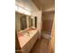 Bathroom featuring a shower/tub combination and a sink with vanity at 3144 N 84Th Pl, Scottsdale, AZ 85251