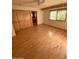 Bedroom with hardwood floors, large closets and a view to the bathroom at 3144 N 84Th Pl, Scottsdale, AZ 85251