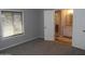 Bedroom with adjacent bathroom; an ensuite with double doors at 329 N 83Rd Pl, Mesa, AZ 85207