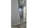 Hallway leading to a bathroom with a view into a bedroom at 329 N 83Rd Pl, Mesa, AZ 85207