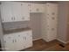Bright kitchen featuring ample white cabinets and counter space at 329 N 83Rd Pl, Mesa, AZ 85207