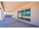Spacious covered patio with sliding glass doors, providing indoor/outdoor living at 35234 N Barley St, San Tan Valley, AZ 85144