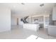 Spacious kitchen with a large center island and stainless steel appliances at 35234 N Barley St, San Tan Valley, AZ 85144