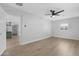 Modern bedroom with light wood floors and white walls, offering a bright and spacious atmosphere at 3607 N 79Th Ave, Phoenix, AZ 85033