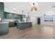 Open-concept living room with kitchen access, showcasing modern design and spacious layout at 3607 N 79Th Ave, Phoenix, AZ 85033