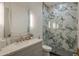 Elegant bathroom featuring marble shower, granite vanity, and modern mirror at 3626 N Mohave Way, Scottsdale, AZ 85251