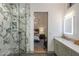 Beautifully designed bathroom with marble shower, modern vanity, and stylish lighting, offering a luxurious feel at 3626 N Mohave Way, Scottsdale, AZ 85251