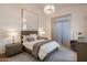 Serene bedroom featuring soft lighting, plush bedding, and stylish decor for a relaxing retreat at 3626 N Mohave Way, Scottsdale, AZ 85251