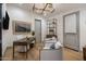 Stylish home office with modern decor, ample lighting, and comfortable seating, ideal for productivity at 3626 N Mohave Way, Scottsdale, AZ 85251