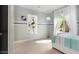 Bright bedroom features a large window, light-colored walls, and neutral flooring at 4073 E Stable Ct, Gilbert, AZ 85297