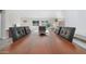 Modern dining room showcasing an oversized wooden table with stylish seating at 4073 E Stable Ct, Gilbert, AZ 85297