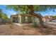 Charming single-story home featuring a two car garage, desert landscaping, and a covered entryway at 4073 E Stable Ct, Gilbert, AZ 85297