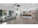 Bright kitchen and living area showcasing an open floor plan with neutral tones and modern finishes at 4073 E Stable Ct, Gilbert, AZ 85297