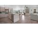 Spacious kitchen with modern appliances, breakfast bar, and an open view to the living area at 4073 E Stable Ct, Gilbert, AZ 85297