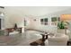 Bright living room with plenty of natural light, tile floors and comfortable furnishings at 4073 E Stable Ct, Gilbert, AZ 85297