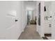 Hallway leading to a bedroom and bathroom, with carpet and light colored walls at 4283 W Nora Dr, San Tan Valley, AZ 85144