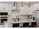 Beautiful kitchen with white cabinetry, stainless steel appliances, and granite countertops at 4283 W Nora Dr, San Tan Valley, AZ 85144