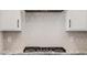 Detailed shot of kitchen backsplash and gas range at 4283 W Nora Dr, San Tan Valley, AZ 85144