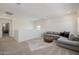 Comfortable living space with light gray walls and carpet at 4283 W Nora Dr, San Tan Valley, AZ 85144