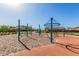 A playground features a unique web climber structure with blue posts and tan sand at 4283 W Nora Dr, San Tan Valley, AZ 85144