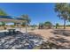 Well-equipped park with picnic tables, playground with slides, and climbing structures, ideal for Gathering outings at 4283 W Nora Dr, San Tan Valley, AZ 85144
