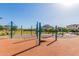 Community playground featuring modern blue play structure and soft, safe ground covering for play at 4283 W Nora Dr, San Tan Valley, AZ 85144