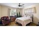 A cozy bedroom with vintage charm, filled with natural light and cozy furnishings at 4510 E Calle Tuberia --, Phoenix, AZ 85018