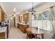 A bright eat-in kitchen boasts wood cabinetry and a window overlooking the backyard at 4510 E Calle Tuberia --, Phoenix, AZ 85018