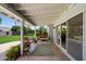 Inviting covered patio with porch swings and comfortable seating area at 4510 E Calle Tuberia --, Phoenix, AZ 85018