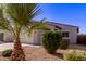 Charming one-story home featuring desert landscaping and a neutral color palette at 45722 W Sky Ln, Maricopa, AZ 85139